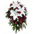 Bouquet de novia de lirios blancos y rosas rojas